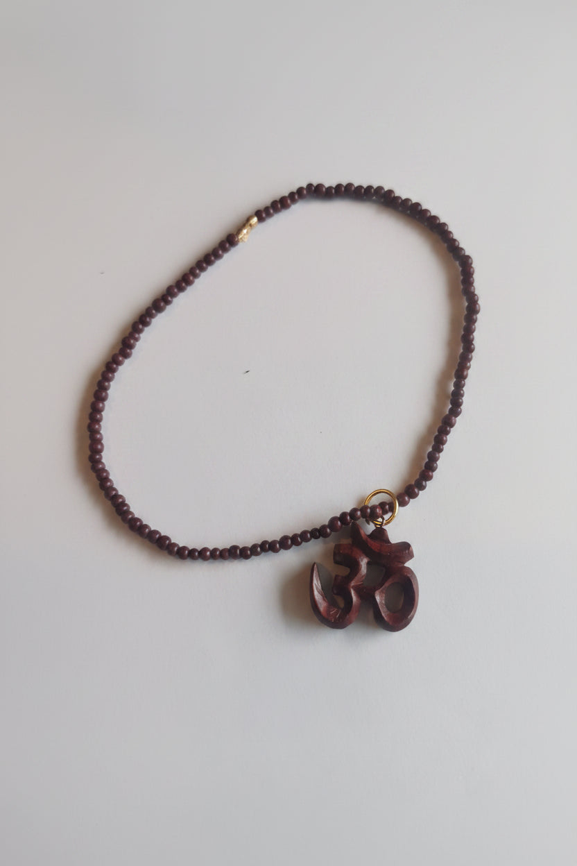 Rose wood  om neckless